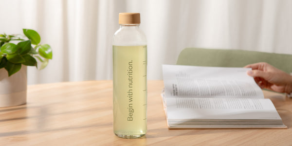 Wasserflasche mit Print Begin with nutrition